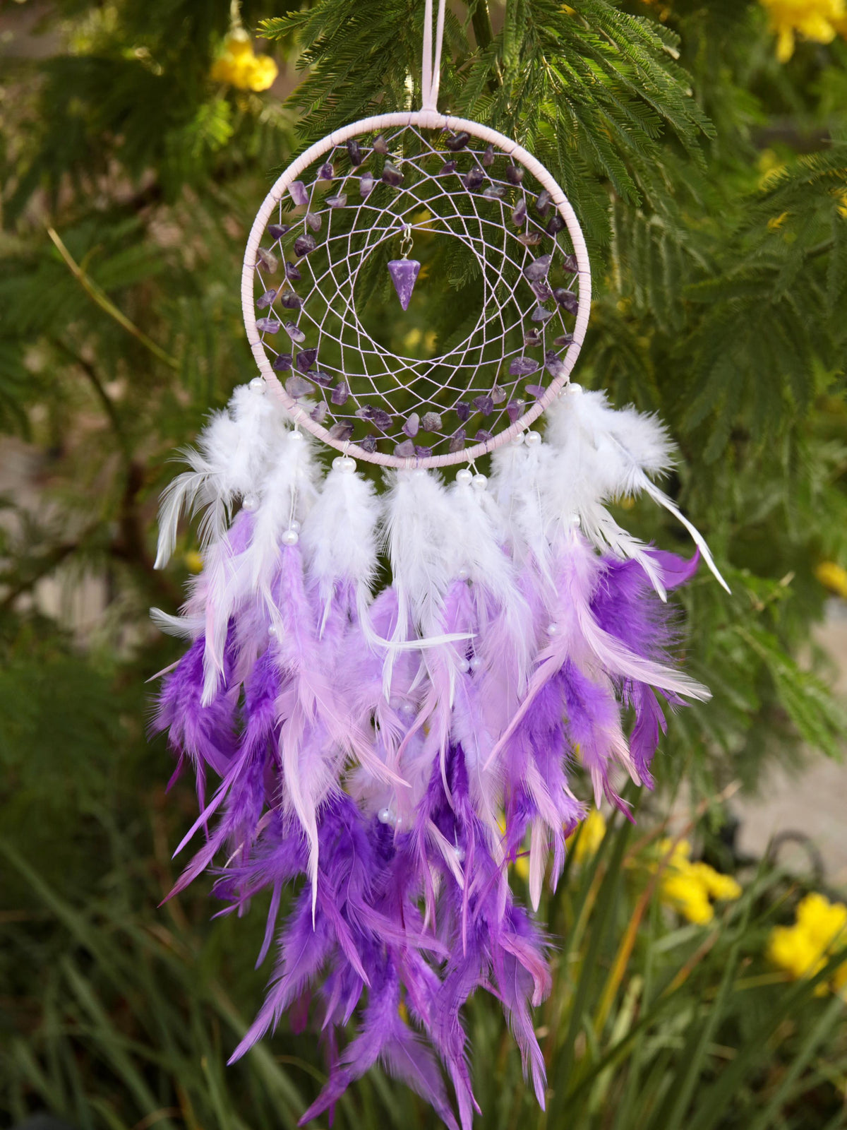 Amethyst chip dreamcatcher hand woven  with  purple, white  and lilac fluffy feathers decorated with beads.