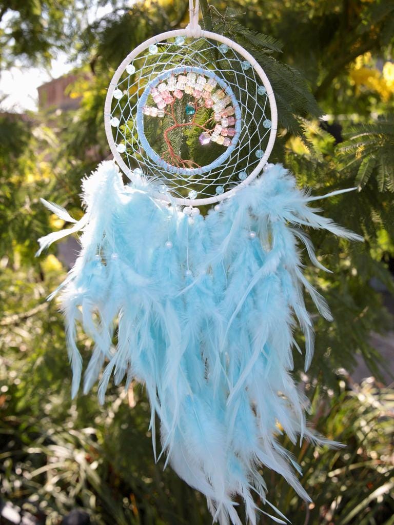 Dreamcatcher, woven sky blue with crystal tree of life centre, hanging blue feathers. Birthday gift, welcome to new home present.