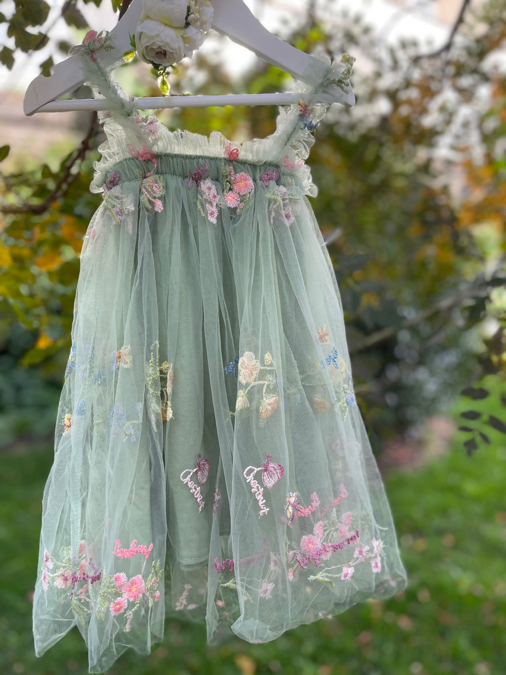 Girls sage green embroidered dress with extra soft lining.