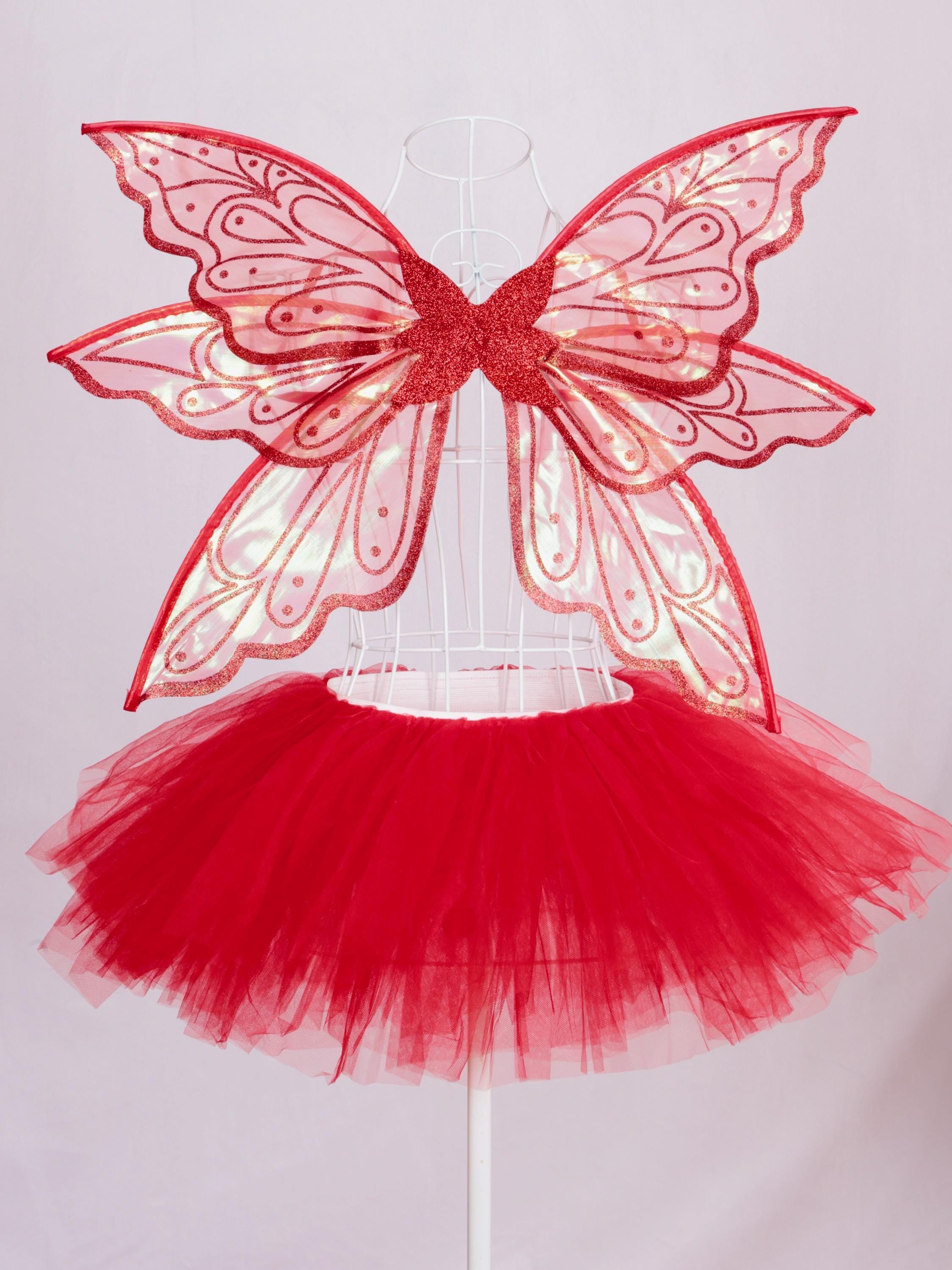 Red tutu skirt and wings  wings. Women size red tutu skirt paired with optional red fairy wings.  Hen party. Girls Night Out.