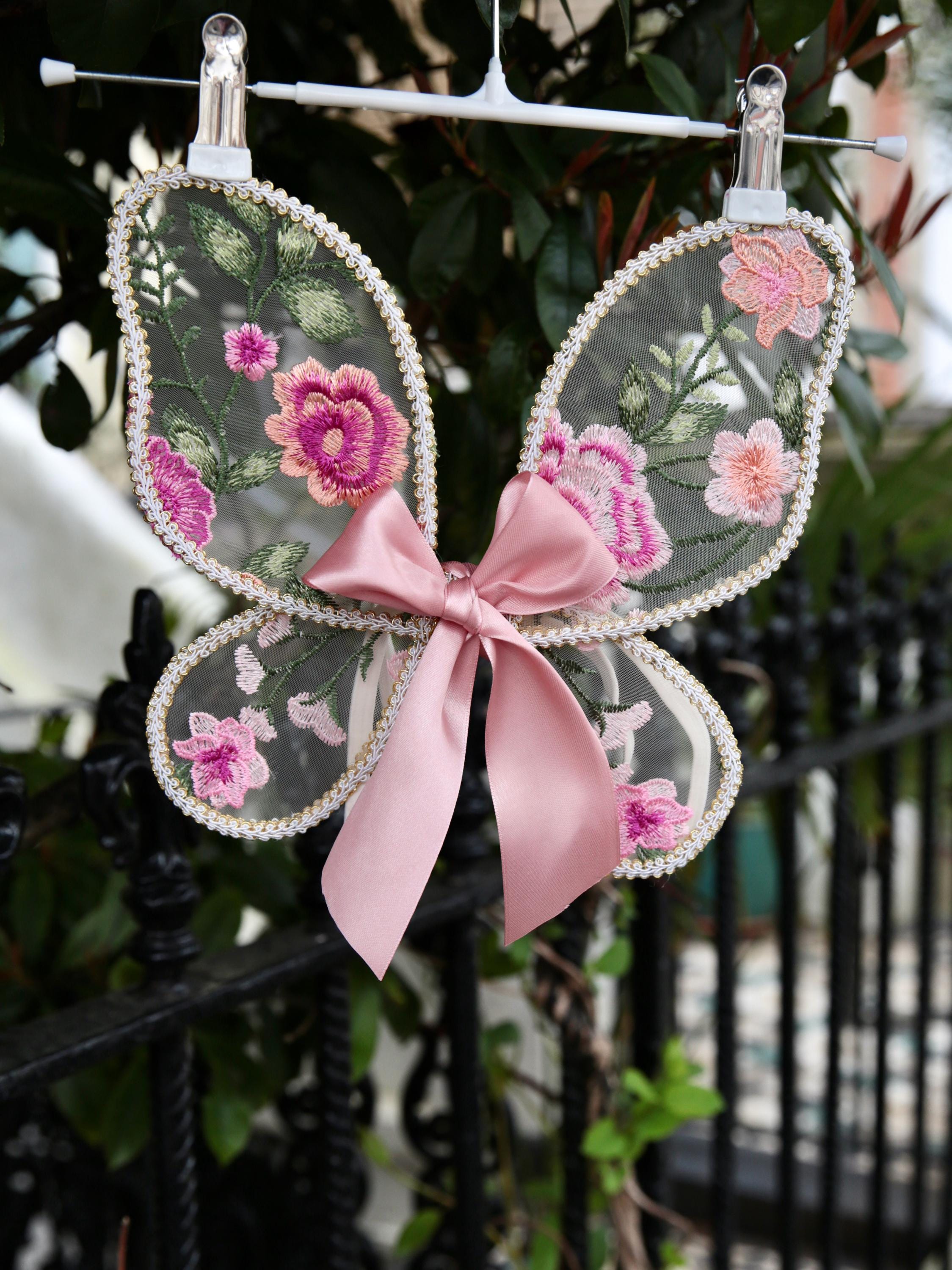 Pink Fairy wings for babies. Tulle fabric with handcrafted embroidered pink flower design. Cake smash, birthday photo shoot.