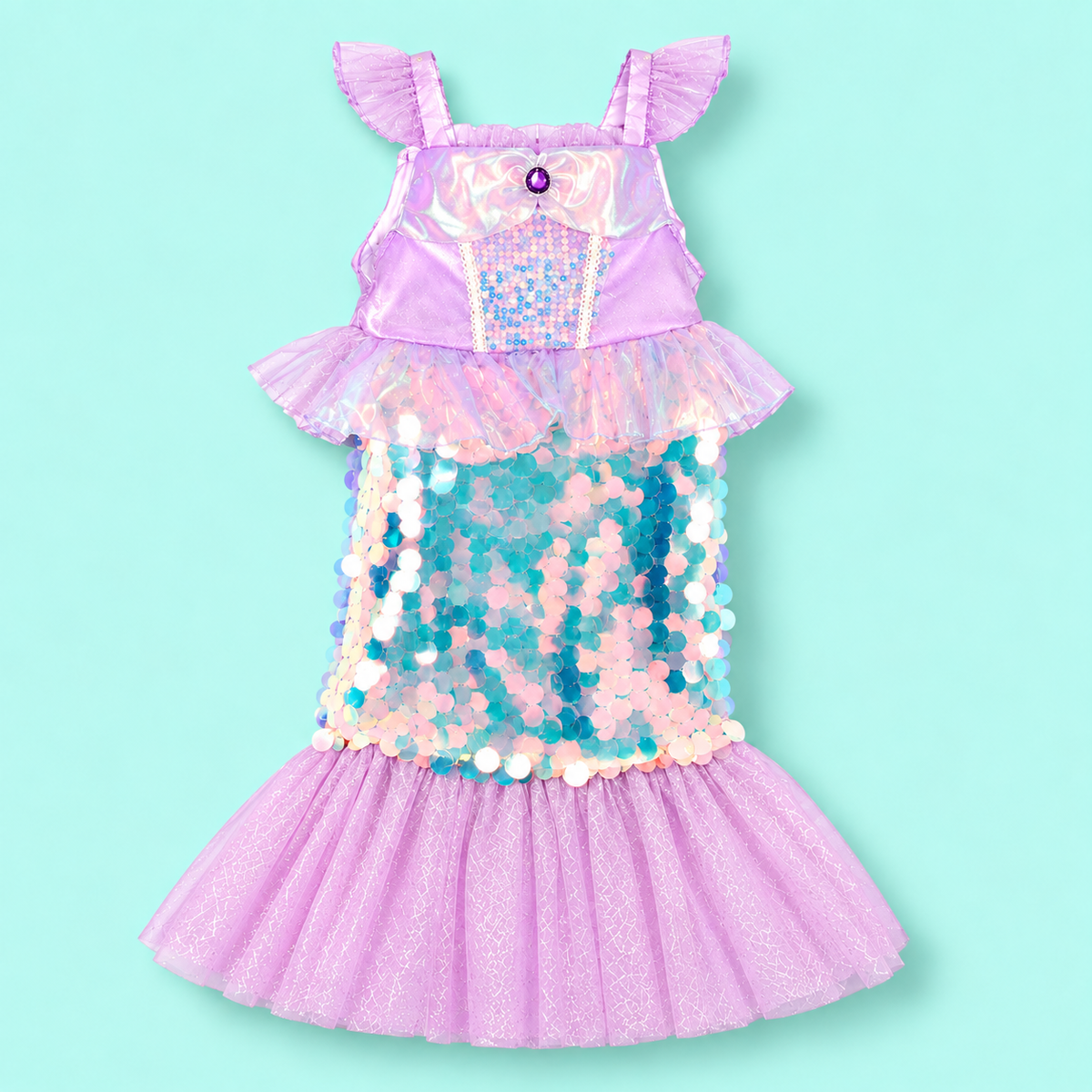 Girls mermaid costume dress in pastel lilac, aqua and pink, with flutter sleeves, an iridescent bodice and waist ruffle, large shimmering turquoise and pearlescent sequins covering the long skirt, and a wide lilac glitter tulle fishtail hem creating a classic mermaid tail shape.